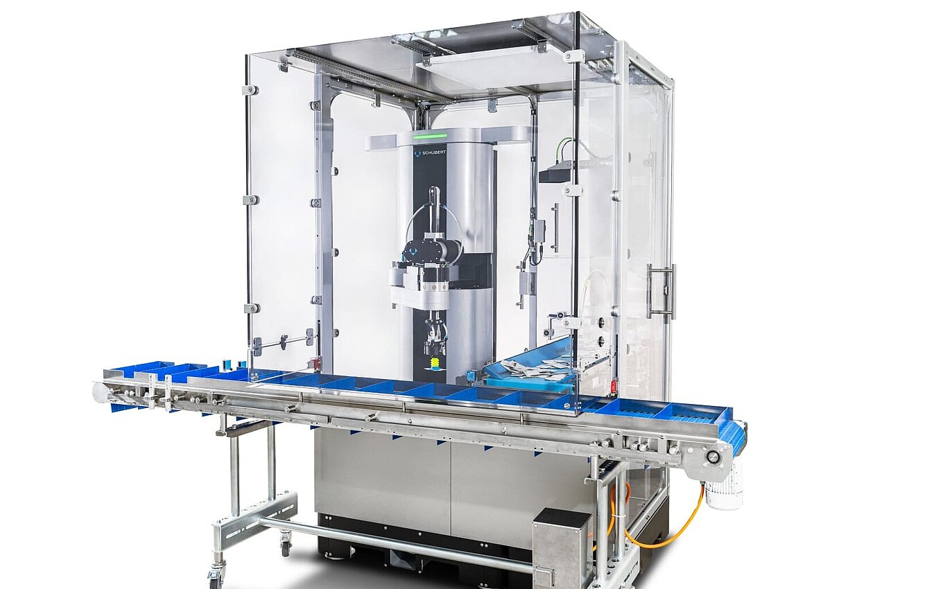 Automatisierte Verpackungsmaschine im PrePackaging Service von Faller Packaging – effiziente Lösung für die pharmazeutische Produktion.